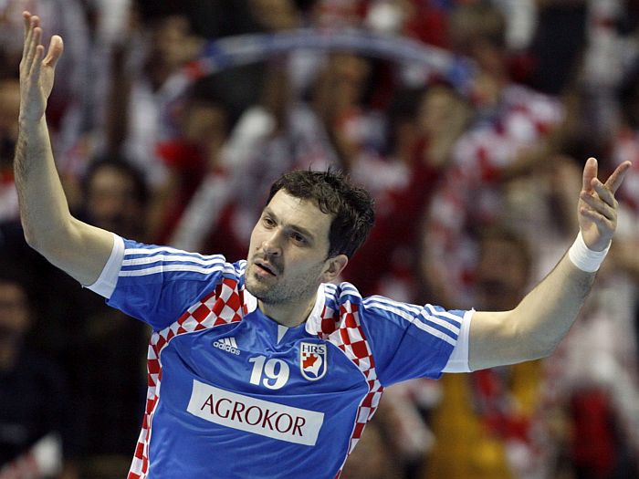 Croatia's Metlicic celebrates a goal against Sweden during their Men's World Handball Championship preliminary Group B match in Split